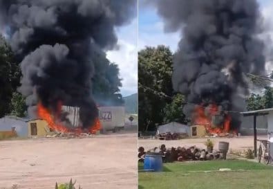 Motorista morre carbonizado após carreta bater em borracharia na BR-364
