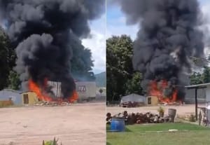 Motorista morre carbonizado após carreta bater em borracharia na BR-364